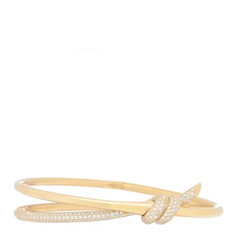 This is an authentic TIFFANY 18K Yellow Gold Diamond Knot Double Row Hinged Bangle Bracelet. The bracelet is crafted of 18 karat yellow gold and features a hinged double row bangle with a twisted knot motif, accented with round brilliant cut diamonds, approximately 2.05 total carat weight. 1375794 Tiffany Knot Bracelet, Tiffany Gold Bracelet, Gold Diamond Bangles, Tiffany Bracelet Gold, Tiffany Bracelet, Tiffany Bangle, Tiffany And Co Bracelet, Diamond Knot, Tiffany Bracelets