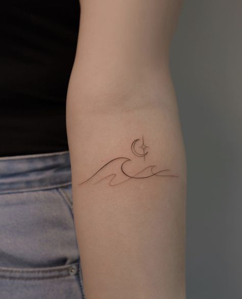 Jonaxx Tattoo Ideas, Water Ankle Tattoo, Wave Elbow Tattoo, Cool Wave Tattoos, I Can Go The Distance Tattoo, Beach Waves Tattoo Ideas, Celestial Ocean Tattoo, Moon And Waves Tattoo Simple, Ocean Wave Tattoo Minimalist