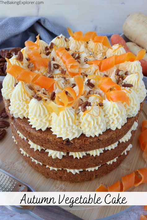 Autumn Vegetable Cake with carrot, parsnip, sweet potato, orange, ginger, pecans and spices. With orange buttercream and candied carrot curls #thebakingexplorer #vegetablecake #carrotcake #autumncake #fallbaking Pipeable Cream Cheese Frosting, Autumn Baking Recipes, Recipe For Carrot Cake, Cake With Pecans, Carrot Parsnip, Vegetable Cake, Orange Buttercream, Autumn Baking, Kitchen Larder