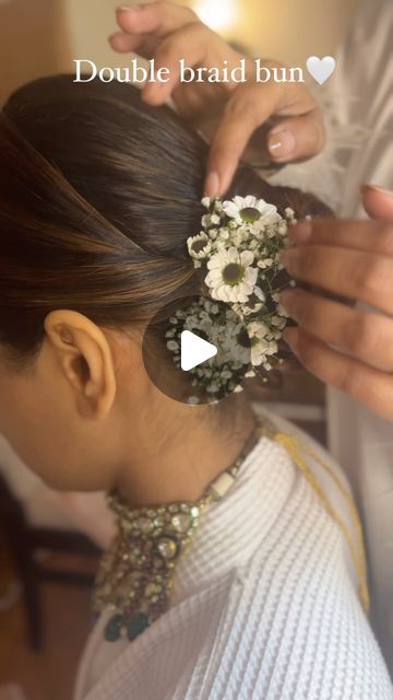 pratiksha NP on Instagram: "“Double braid bun “ in the making 🤍

Hair: @hairbypratiksha 

#trendinghairstyles #bridalhair #bridesofinstagram #uniquehair #bridesbypratikshaverma #trendinghairstyles #haircreation #hairlove #weddingbun #indianhairstyles #weddinghairstyles #mumbaihairstylist
#bridalhairdo #bridesofsouthindia 
@wedmegood @weddingsutra @weddingbazaarofficial @thebridesofindia @witty_wedding @wedabout @weddingwireindia @weddingbazaarofficial @weddingbazaarfashion @thebridesofindia" Bun Hairstyles With Flowers, Hair Bun With Flowers, Flower Bun Hairstyle, Flower Hair Bun, Mehndi Hairstyles, Wedding Bun, Braid Bun, Flower Bun, Bridal Hairdo