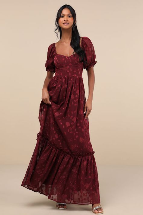 You'll radiate an exceptional essence all night long with the Lulus Phenomenal Sweetness Burgundy Floral Burnout Bustier Maxi Dress! Airy woven chiffon jacquard, with a burnout floral design throughout, shapes this romantic dress that features a bustier-inspired bodice with seamed cups, a sweetheart neckline, and short puff sleeves (with elastic at the shoulders and cuffs). The high, fitted waist tops a flowy, A-line skirt that cascades down to a tiered maxi hem. Hidden back zipper/clasp. Fit: T Boho Burgundy Dress, Big Skirt Dress, Quinceanera Guest Dress, Red Summer Bridesmaid Dresses, Lulus Red Dress, Fall Floral Dresses, Maroon Dress Casual, Whimsical Bridesmaid Dresses, Modest Prom Dresses With Sleeves