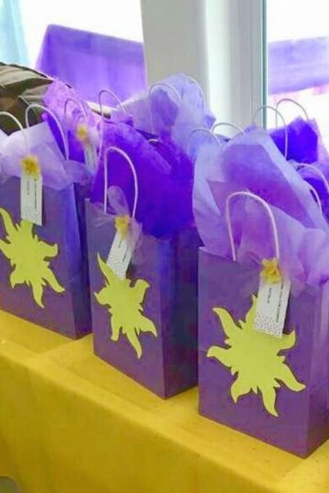 Take a look at this pretty Rapunzel-themed princess birthday party! The party favor bags are gorgeous! See more party ideas and share yours at CatchMyParty.com #catchmyparty #partyideas #rapunzel #rapunzelparty #tangled #princessparty #rapunzelpartyfavors Tangled Party Backdrop, Rapunzel Party Games, Tangled Party Favors, Rapunzel Party Favors, Rapunzel Party Decorations, Rapunzel Party Ideas, Tangled Themed Birthday Party, Rapunzel Birthday Party Ideas, Rapunzel Themed Birthday Party