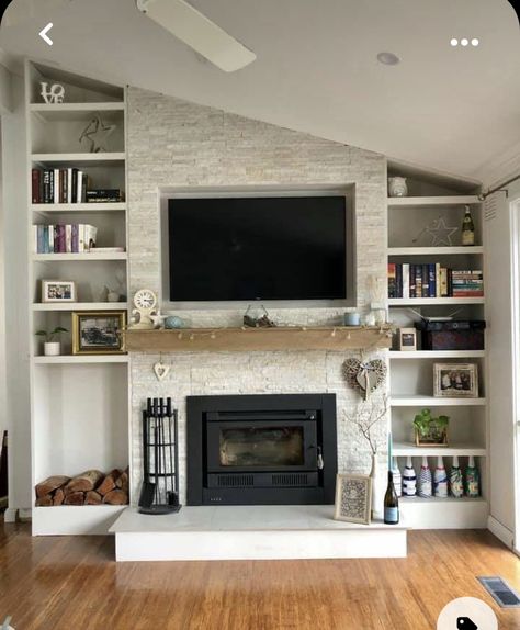 Fireplace Wall Bookshelves, Built Ins On Vaulted Wall, Built In Shelves Living Room Fireplace Angled Ceiling, Built In Entertainment Center Angled Ceiling, Built In Angled Ceiling, Diy Fireplace Angled Ceiling, Narrow Fireplace Built Ins, Built Ins With Angled Ceiling, Fireplace Built In Shelves Vaulted Ceiling