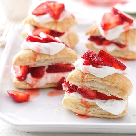 Strawberry Shortcake Puffs Recipe -When my wonderful friend Kelly brought me a pint of strawberries, I didn’t want to just eat them straight (tempting as it was). I decided to make strawberry shortcake with my own pretty, elegant spin. These light and airy puff pastry stacks let the fruit shine. —Jenny Dubinsky, Inwood, West Virginia Cookie Delight, Napoleons Recipe, Puff Pastry Recipes Dessert, Mousse Au Chocolat Torte, Strawberry Shortcakes, Easy Puff, Puff Pastry Desserts, Desserts Ideas, Potluck Desserts