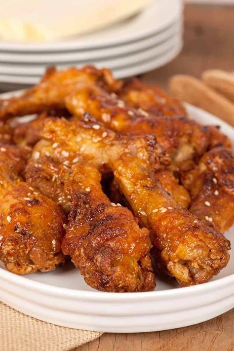 These chicken wing drumettes are oven-fried, have a crispy skin and a tangy glaze made with orange juice, soy sauce, sriracha and brown sugar. #appetizer #recipe #chicken Oven Fried Chicken Wings, Chicken Drumettes, Cooked Chicken Temperature, Oven Baked Chicken Wings, Fried Macaroni, Baked Chicken Wings Oven, Chicken Breast Crockpot Recipes, Boiled Chicken Breast, Crockpot Chicken Breast