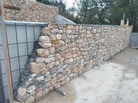 River Rock Wall, Interior Stone Wall, Building A Stone Wall, Simple Flower Beds, Retaining Wall Design, Stone Retaining Wall, Stone Cottages, Landscaping Retaining Walls, Natural Stone Wall