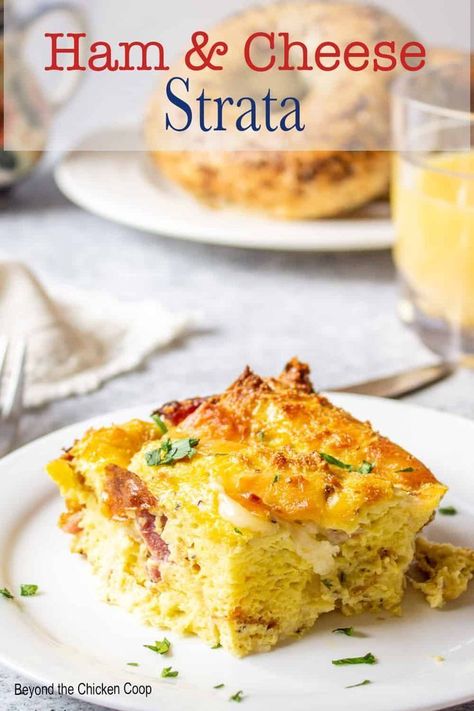 Whether you're planning a hearty breakfast, brunch, or even breakfast for dinner, this ham and cheese strata is your best bet for a delicious and easy meal. This homemade dish combines the rich flavors of ham and cheese with eggs in a simple yet impressive way. Try it now! Ham And Cheese Strata Recipes, Ham And Cheese Strata, Breakfast Casserole Dishes, Ham And Cheese Casserole, Ham Breakfast Casserole, Cheese Strata, Egg Casseroles, Strata Recipes, Breakfast Strata