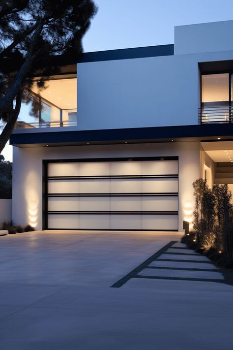 Exterior Garage Ideas: Modern and Discreet Door Design Modern Coastal Garage Door, Modern Aluminium Garage Doors, Classic Garage Design, Modern Garage Lights Exterior, Garage Door Remodel, Modern Garage Doors With Windows, Exterior Garage Ideas, Garage Design Exterior, Garage Ideas Exterior