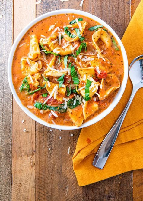 Creamy Parm Tomato Soup - Delish.com Parm Tomato Soup, Meatless Soup, Creamy Tortellini Soup, Tomato Tortellini Soup, Fall Soup, Fall Soup Recipes, Creamy Parmesan, Tomato Soup Recipes, Tortellini Soup