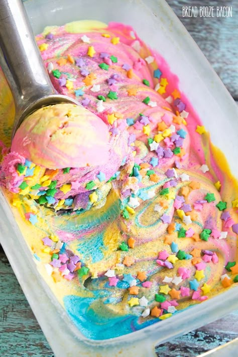 Unicorn Ice Cream is magic on a cone! There's nothing better on a hot day than rainbow ice cream that's covered in star sprinkles and glitter! Bread Booze Bacon, Unicorn Ice Cream, Unicorn Desserts, Pastel Cupcakes, Unicorn Party Ideas, Rainbow Ice Cream, Star Sprinkles, Rainbow Food, Crazy Cakes