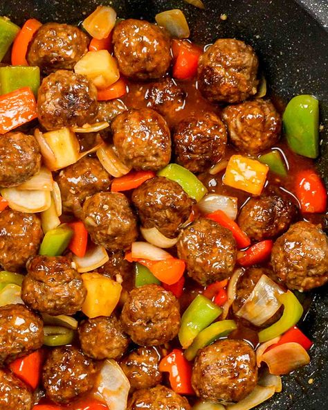 Tossed together with sweet pineapple and stir-fried veggies, these tasty quick and easy Sweet and Sour Meatballs can be baked or air fried! #sweetandsour #meatballs #recipe Meat Veggie Dinner, Ww Meatball Recipes, Meat And Veggie Dinners Low Carb, Sweet And Sour Hamburger, Meatball Recipes Pineapple, At Home Lunches For Adults, Meatball And Peppers, Sweet A D Sour Meatballs, All Veggie Recipes