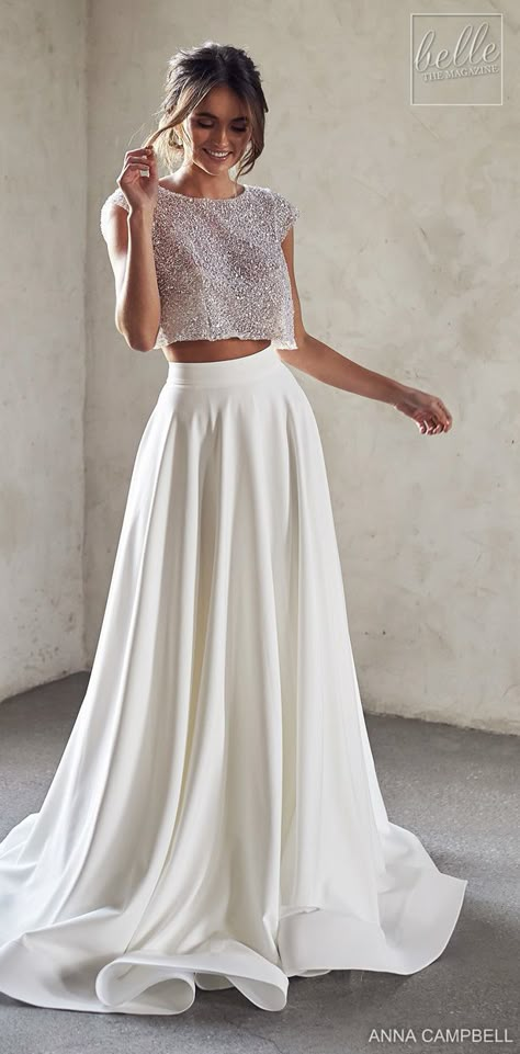 Anna Campbell 2020 Wedding Dress Lumiére Bridal Collection - Meadow Topper with Ava Separate Skirt | Two-piece a-line wedding dress with crop top with cap sleeves made out of hand-beaded sparkling sequinned tulle and simple skirt #weddingdress #weddingdresses #bridalgown #bridal #bridalgowns #weddinggown #bridetobe #weddings #bride #dreamdress #bridalcollection #bridaldress #dress See more gorgeous wedding dresses by clicking on the photo Wedding Dresses Skirt And Top, Tulle Skirt Wedding Dress Two Pieces, Wedding Dress Crop Top Two Pieces, Bride Dress Two Pieces, Sequin Top Wedding Dress, Bride Two Piece Dress, Tulle Skirt Crop Top, White Beaded Crop Top, Wedding Dresses 2 Piece Crop Tops