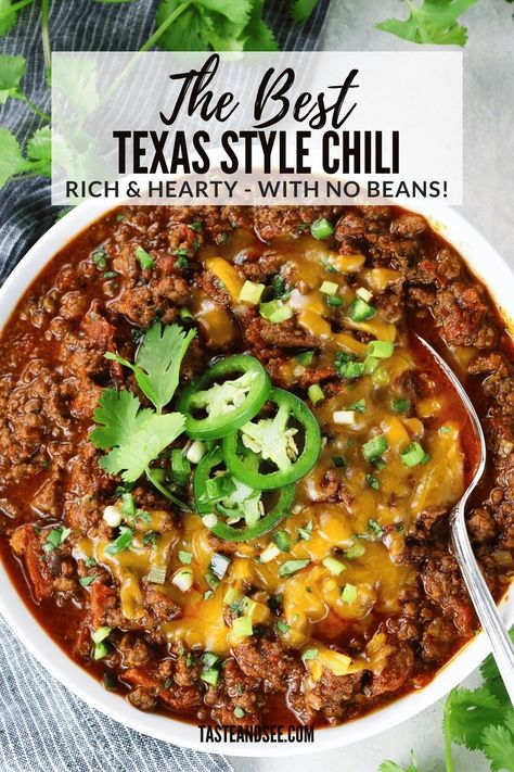 This Texas Style Chili Recipe is thick and hearty with a rich beefy flavor. It has no beans but instead is infused with Mexican spices, packed with hearty ground beef, and loaded with flavorful veggies like garlic, jalapeños, onions, and tomatoes. This Texas Chili Recipe is perfect for feeding a crowd on game day or serving as a comforting family dinner! #TasteAndSee Chili Texas Style, Chili With No Beans Crockpot, Spicy Texas Chili Recipe, Chili Recipe Texas, No Bean Beef Chili Recipes, The Best Texas Chili Recipe, Beef Chili No Beans Recipe, Best Meat Chili Recipe, Best Chili Without Beans