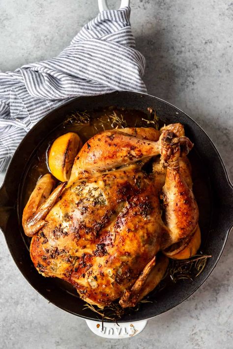 Slow Roasted Chicken slathered in garlic butter is a must for special occasions like Easter! This easy whole roast chicken recipe is absolutely fail-proof with my step-by-step instructions, and ready in 1-2 hours, depending on the size of your chicken. The whole family will love this juicy, tender roasted whole chicken recipe! #best #chicken #roasted #roast #whole #easy #lemon #garlic Slow Roasted Chicken, Best Roast Chicken Recipe, Baked Whole Chicken Recipes, Whole Roast Chicken Recipe, Whole Roast Chicken, Roasted Whole Chicken, Whole Baked Chicken, Whole Chicken Recipe, Best Roasted Chicken