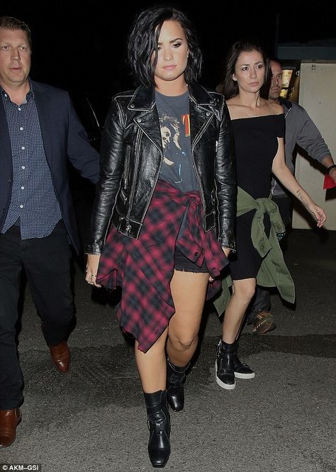 Trendy: Demi Lovato looked nineties chic in black shorts, a graphic T-shirt, leather jacket and red plaid top tied around her waist Tied Around Waist Outfits, Demi Lovato Style Outfits, Demi Lavato, Demi Lovato Style, Sugar Mommy, Dark Style, Style Goals, Looks Street Style, Punk Outfits