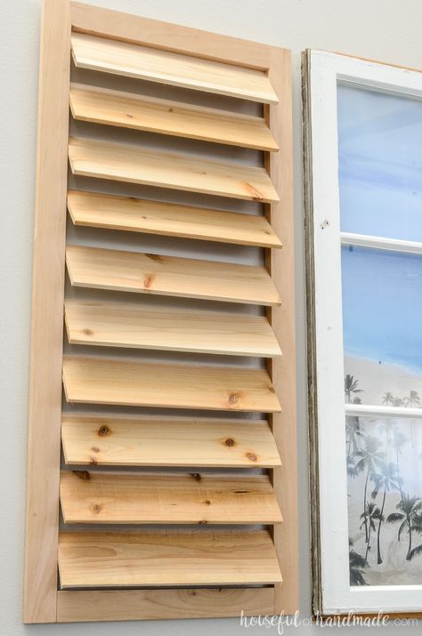 These easy to build shutter decor will add character to any room. Place them next to your windows or even next to a vintage window. Get the complete build plans at Housefulofhandmade.com. | #DIY #buildplans #homedecor #tropicaldecor #shutters #woodworking #diydecor Window Outside Shutters, Diy Wooden Window Shutters, Diy Bahama Shutters Exterior Wood, How To Make Louvered Shutters, How To Make Wooden Shutters, How To Make Window Shutters, Diy Wooden Blinds, Louver Windows Ideas, Interior Wooden Shutters