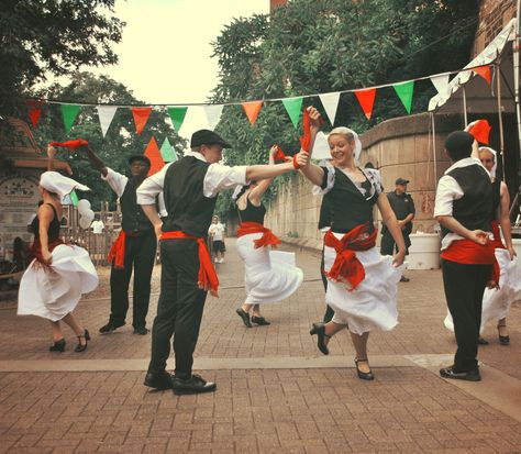 Another tradition is the Italian folk dance, as seen in the picture. For centuries, dances has been an integral part of Italian tradition and symbolize the continuous thread of Italian life. Three of the most popular dances are the Tarantella from Puglia, the Sardinian ballu tundu and the Neapolitan Saltarello. The tarantella is conducted to heal mythical tarantula bites, hence the similarity between the words. Italian folk dances are performed on special occasions such as a wedding. Italian Dance Traditional, Italian Culture Traditions, Italian Culture Aesthetic, Tarantella Dance, Italian Dance, Popular Dances, Mediterranean Culture, Dance Culture, Italian Music