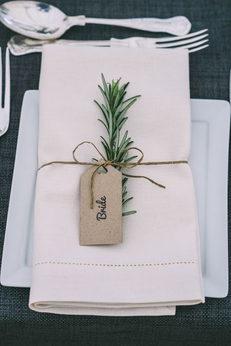 Rosemary accented wedding place name setting attached with DIY tag Wedding Name Tags, Place Card Table Wedding, Rustic Wedding Decorations, Wedding Place Names, Table Place Cards, בר מצווה, Wedding Name, Wedding Table Decorations, Wedding Table Settings