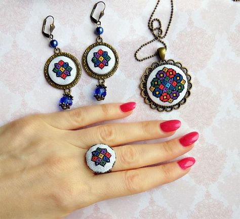 Micro embroidery Ukrainian ornament set of Necklace, Earrings and Ring, Ukrainian gift, Hand Embroidery, Gift for women, embroidered jewelry. Details This beautiful Ukrainian ornament set of Necklace, Earrings and Ring, with a hand cross stitch embroidered. A perfect accessory or #wyclyfcarrickg Stitch Ring, Embroidery Ring, Cross Stitch Necklace, Stitch Jewelry, Embroidered Jewelry, Learn Embroidery, Jewelry Details, Embroidery Gifts, Brazilian Embroidery