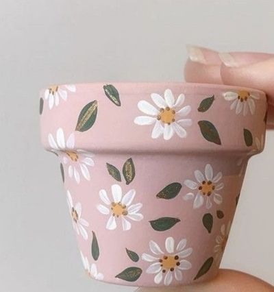 50 STUNNING Flower Pot Painting Ideas - Craftionary Flower Pot Painting Ideas, Flower Pot Painting, Pot Painting Ideas, Plant Pot Design, Diy Pottery Painting, Flower Pot Art, Pot Painting, Terra Cotta Pot Crafts, Painted Pots Diy