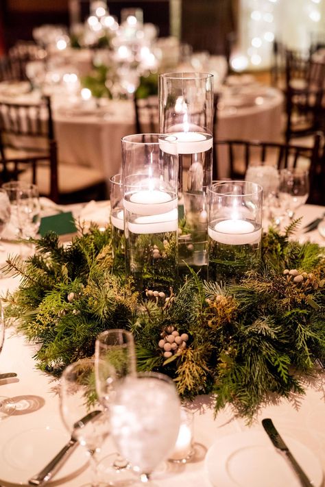 Candlelit Winter Mountain Wedding | Vail Real Wedding | Item 30 Winter Wedding Table Centerpieces Simple, Winter Wedding Centerpieces Rectangle Table, Winter Wedding Center Piece, Winter Wedding Tablescapes Round, Christmas Table Decorations Wedding, December Wedding Centerpieces Receptions, Winter Green Wedding Theme, Round Table Winter Wedding Decor, Winter Wedding 2023