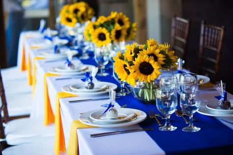 sunflowers+and+blue+wedding | Sunflowers and blue table. Sunflower Senior Serve Table, Royal Blue And Sunflower Wedding Theme, Yellow And Blue Wedding Decorations, Royal Blue And Sunflower Wedding, Yellow And Blue Wedding Theme, Sunflower And Blue Wedding, Brunch Table Decorations, Yellow And Blue Wedding, Blue Sunflower Wedding