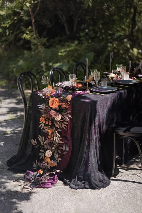 Dark Outside Wedding Theme, Witch Wedding Ideas Decor, Gothic Aisle Decor, Gothic Wedding Table Settings, Dark And Moody Wedding Table Setting, Black Purple Orange Wedding, Skeleton Wedding Decorations, Dark Flower Centerpieces, Witchy Wedding Table Decor