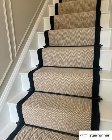 Definitely one of our best sellers! Fibre Flooring Chalk herringbone with black border @fibreflooring @jaspa_binding_tapes stair runner and landing carpet. Black jubilee stair rods @stairrods_uk #stairs #stairrunner #carpet #stairrods #stairrunners Black Stair Rods Carpet Runner, Sisal Stair Runner With Rods, Grey Stair Runner With Black Edge, Beige And Black Stair Runner, Stair Runner Black Trim, Carpet Runner On Stairs Brass Rods, Stair Runner Bars, Stair Runner With Border, Stair Carpet Runner With Rods