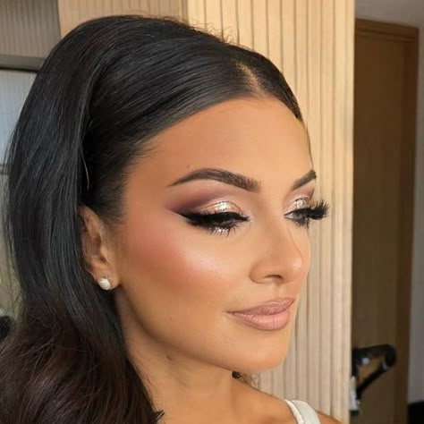 Makeup Artist on Instagram: "Full glam bride 💗 . . @patricktabeauty major dimensions rose palette @anastasiabeverlyhills luminous foundation @__dollbeauty_ shine bright highlighter, give me sun bronzer & come to mumma lipstick @maccosmetics strip down liner @velvetlash.official dior lashes @urbandecaycosmetics midnight cowboy glitter liner . @hairbyhatem . #perthmua #mua #makeup #makeuplooks #motd #fyp #hudabeauty #makeuplover #makeupideas #abh #makeupjunkie #makeuptutorials #makeupaddic Wedding Inspired Makeup, Rose Gold Eye Makeup Wedding, Bride Makeup Winged Eyeliner, Bride Makeup Full Glam, Bronze Full Glam Makeup, Full Glam Bride Makeup, Bridal Full Glam Makeup, Sparkly Wedding Makeup, Makeup Looks For Wedding Bridesmaid