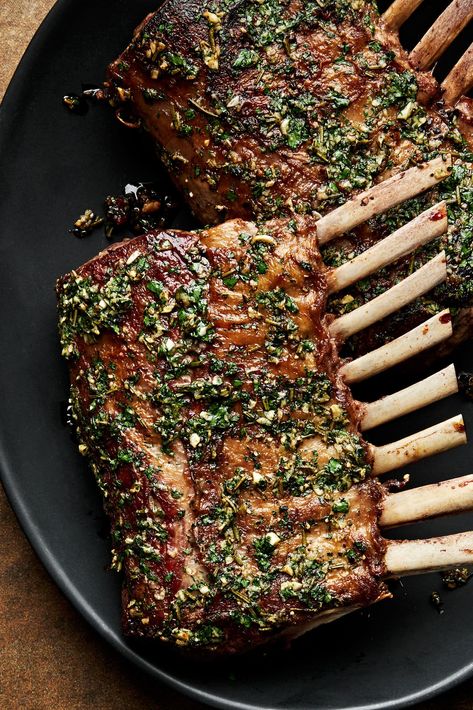 A rack of lamb is an elegant, yet easy to prepare meal. Lamb is first seared in a hot skillet and then finished in the oven with an herb oil. Serve with a bright mint sauce and veggies. How To Roast Lamb In Oven, Reverse Sear Lamb Chops, Roast Rack Of Lamb Recipes, How To Cook Lamb Rack, Recipe Lamb Chops, Greek Rack Of Lamb, Oven Roasted Lamb Ribs, Lebanese Lamb Chops, Christmas Rack Of Lamb Recipes