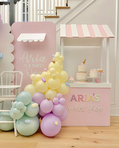 Aria’s Sweet Shop 🍦🍨🌸 Cutout words on Candy Cart @propulareventsllc Design | Balloons | Backdrops @sayit_withballoons #cltballoons… | Instagram Two Sweet Backdrop Ideas, Sweet One Birthday Backdrop, Sweet Caroline Birthday Theme, Sweet Shop Birthday Party, Too Sweet Birthday Party Ideas, Two Sweet Party 2nd Birthday Decorations, Sweet One Backdrop, Squish Mellow Party, Candy Land Backdrop