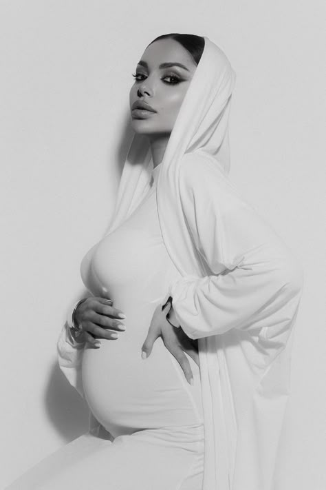 New Years Pregnancy Photoshoot, Baby Breath Maternity Shoot, Maternity Photography White Dress, Maternity Photography Modest, Iconic Maternity Photos, Hijabi Maternity Photoshoot, Modest Maternity Shoot, Classy Pregnancy Photoshoot, Modest Maternity Photoshoot