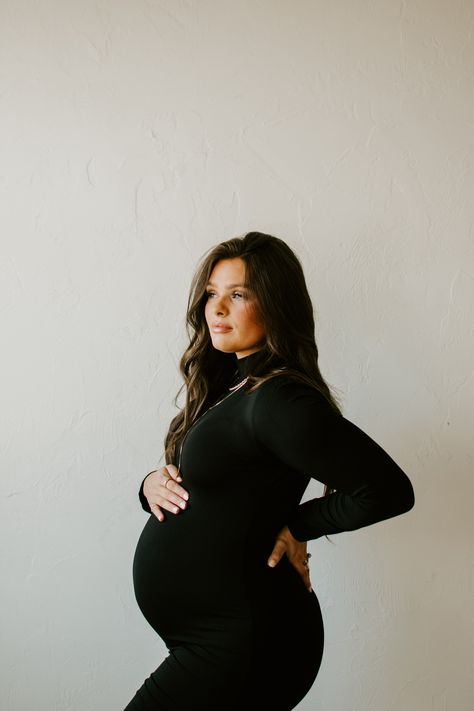 Winter Maternity Pictures Dress, Black Dress Maternity Dress, Maternity Pics Black Dress, Maternity Photo Dress Fall, Mommy Me Maternity, Black Turtleneck Dress Maternity Shoot, Indoor Diy Maternity Photoshoot, Maternity Photos Black Bodysuit, Black Dress Studio Maternity Pictures