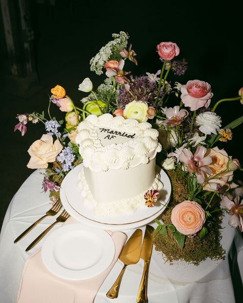 We fell in love with this mini cake & meadow!! All of the tiny details at Lexi & Barry’s wedding really made the day so special. We’d love to do more meadows added to guest tables, cake tables, just about anywhere a whimsical table top garden could grow!! Foam-free, as always 💘🦋 Captured by the sweetest @meagencphotography #weddingcake #cakemeadow #cakegarden #sustainablewedding #kywedding Cake As Table Centerpiece, Floral Cake Design Wedding, Garden Wedding Cake Table, Cottage Core Dessert Table, Mini Wedding Cakes For Each Table, Multiple Cakes Wedding Display, Wedding Cake Meadow, Garden Wedding Cake Ideas, Kitsch Wedding Cake