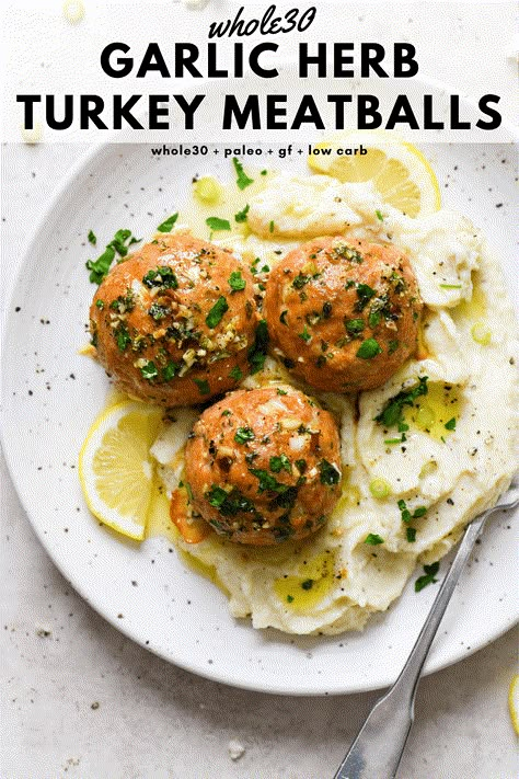 These baked whole30 garlic herb turkey meatballs are a tasty protein rich main dish that are made with ground turkey, fresh herbs, garlic, lemon, and ghee. Perfectly balanced, cooked to perfection, and made without cheese or breadcrumbs. Whole30, paleo, gluten free, low carb + keto friendly. #whole30recipes #turkeymeatballs #glutenfreedairyfree #lowcarb #ketofriendly Whole 30 Turkey, Whole30 Turkey Meatballs, Garlic Herb Turkey, Paleo Turkey Meatballs, Gluten Free Turkey Meatballs, Turkey Meatballs Recipe, Paleo Turkey, Ground Turkey Meatballs, Gluten Free Turkey