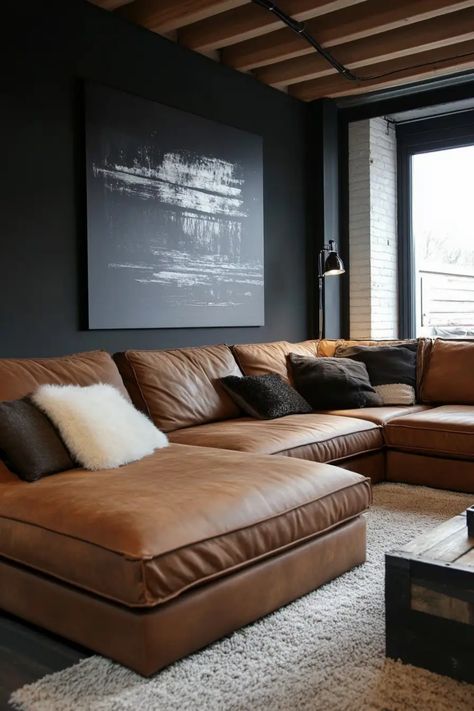 Looking to spruce up your living room with a brown couch? Explore these inspiring ideas for incorporating a brown leather couch in your space. From cozy throws to vibrant accent pillows, discover how to make your brown couch the focal point of your living room. Get creative with unique decor pieces and bold artwork that complement the warm tones of your brown sofa. Whether you prefer a modern or eclectic style, there are endless possibilities for styling a living room around a beautiful brown co Brown Couch Black Pillows, Brown Walls Black Furniture, Suede Sofa Living Rooms, Dark Brown Wood Living Room, Cognac Living Room Ideas, Comfy Leather Couch, Cozy Leather Couch Living Rooms, Caramel Sofa Living Room Ideas, Light Brown Leather Couch Living Room