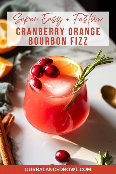 garnished cocktail with cranberries, orange slice and sprig of rosemary Bourbon Fizz, Cranberry Cocktail Recipe, Cranberry Fizz, Unsweetened Cranberry Juice, Holiday Flavors, Cranberry Drinks, Ginger Cocktails, Cranberry Juice Cocktail, Orange Cocktails