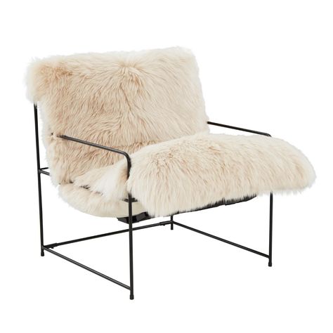 Cozy up with the Kimi Natural Genuine Sheepskin Chair! This transitional statement piece will blend with any aesthetic and add warmth to any space with its humanely sourced sheepskin and modern iron frame. Handmade by skilled furniture craftsmen Sumptuous genuine sheepskin upholstery Neutral color complements most desi Sheepskin Chair, Outdoor Table Decor, White Accent Chair, Cozy Seating, Rooms To Go, Chair Bed, Furniture Care, Wooden Slats, High Fashion Home