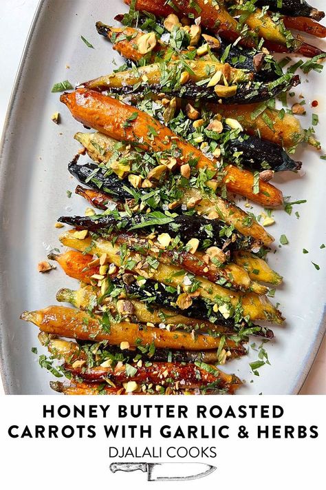 Sweet, tender Honey Butter Roasted Carrots are generously topped with chopped fresh mint, parsley and crunchy dry roasted pistachios. Christmas Roasted Carrots, Holiday Veggie Side Dishes, Roasted Colored Carrots, Multi Color Carrots Recipe, Whole Carrot Recipes, Half Baked Harvest Carrots, Italian Roasted Carrots, Multi Colored Carrots Recipe, Colorful Carrots Recipe