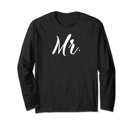 PRICES MAY VARY. Perfect Mr and Mrs long sleeve t-shirts for honeymoon. This shirt says Mr, and will make every husband smile. Pair this Mr long sleeve shirt with the matching Mrs long sleeve to make a beautiful t-shirt gift set for couples, newlyweds. Every husband will love to wear this cute Mr long sleeve t-shirt to show he is married or a new Mr, on his honeymoon, to celebrate his wedding anniversary, or just because. A great Mr long sleeve t-shirt gift from his wife for Christmas, or his bi Honeymoon Couples, Couple Matching Outfits, Groom And Bride, Script Calligraphy, Funny Wedding, Engagement Announcement, Calligraphy Design, Matching Gifts, Couple Matching