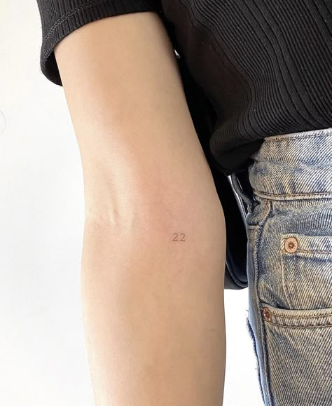 Minimalistic Number Tattoo, Number Arm Tattoos For Women, Initial Tiny Tattoos, Number Tattoos On Arm, Tiny Numbers Tattoo, Small Number Tattoo Ideas, Feminine Number Tattoo, Single Needle Number Tattoo, 3 Numbers Tattoo