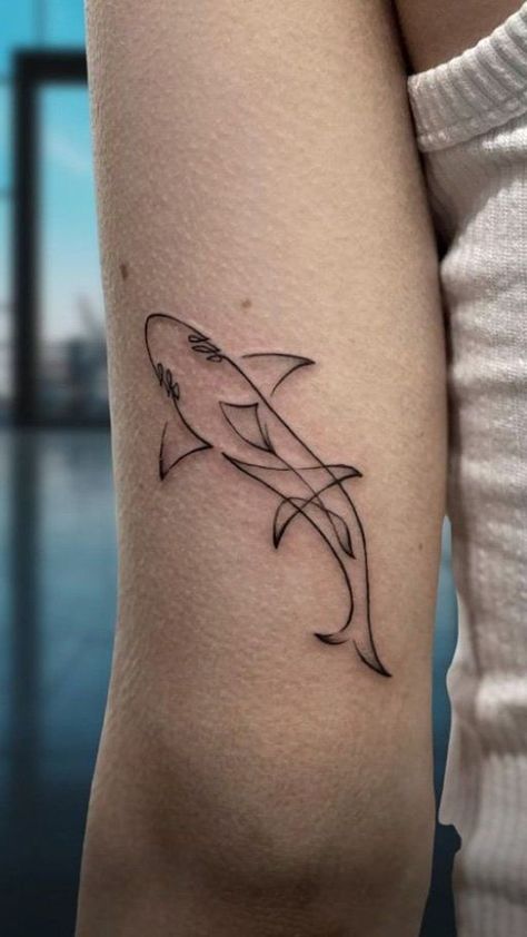 Dive into the deep with shark tattoo ideas. Explore designs that capture the strength and majesty of these fascinating ocean predators. Tattoo Above Elbow, Story Tattoo Ideas, Shark Tattoo Design, Shark Tattoo Ideas, Story Tattoo, Dove Tattoos, Basic Tattoos, Shark Tattoo, Petite Tattoos