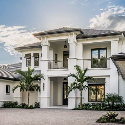 This gorgeous coastal-style residence was designed by Divco Custom Homes along with Design West, located in the luxurious Grey Oaks community of Naples, Florida. Beach Houses Exterior, Modern Coastal Home Exterior, Florida Homes Exterior, Coastal House Exterior, West Indies Home, Coastal Home Exterior, Beautiful Exterior, Luxury Homes Exterior, Coastal House Plans