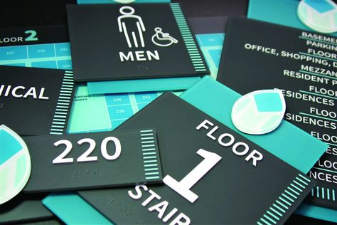 ADA-Compliant Interior Signage | GRAPHICS PRO Ada Restroom Design, Ada Bathroom Design Commercial, Ada Compliant Bathroom, Digital Wayfinding Signage, Ada Signage, Ada Signs, Pricing Calculator, Wayfinding Signs, Sign System