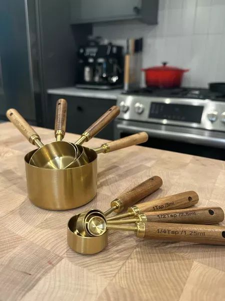 Found a cute new set of gold measuring cups and spoons to replace the plastic ones I’ve had for 8 years 🙃 These were at Amazon find! #kitchenfinds #bakingessentials Gold Measuring Cups, Copper Cups, Measuring Cups And Spoons, Spoon Collection, Lunchbox Ideas, Baking Essentials, Cutlery Set, Kitchen Items