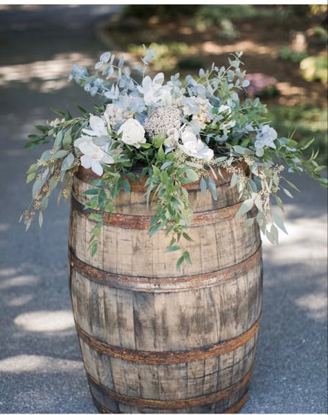 Beverage Tubs Wedding, Wine Barrel Wedding Eucalyptus, Small Boho Bouquet Wedding, Wedding Flowers On Barrels, Rustic Wine Barrel Wedding Decor, Wedding Barrel Flowers, Flowers On Wine Barrels Wedding, Decorating Wine Barrels For A Wedding, Carboy Jug Decor Wedding