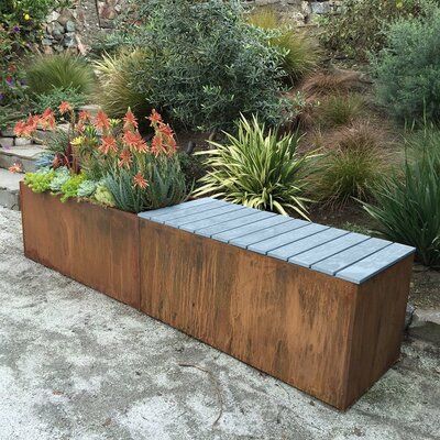 Nice Planter Benches are shaped from Corten Steel by skilled craftsmen utilizing precise folding of the metal to create a planter that uses no welding during the manufacturing process and is in a rectangular shape from 5 panels. Bench panels interlock together to form an incredibly solid plant container that can accommodate large plants. Most of all, the planter is simple, modern and minimalistic. Metal Garden Benches, Planter Bench, Outdoor Garden Bench, Corten Steel Planters, Wooden Garden Benches, Metal Planter Boxes, Trough Planters, Wooden Planter, Sloped Garden