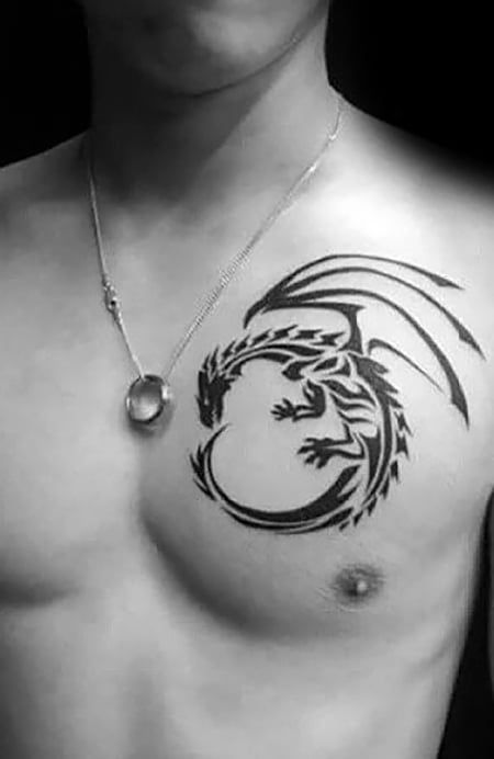 20 Powerful Dragon Tattoo for Men in 2023 - The Trend Spotter Dragon Tattoo For Men, Celtic Tattoos For Men, Powerful Dragon, Dragon Tattoo Meaning, Celtic Dragon Tattoos, Dragons Tattoo, Molecule Tattoo, Dragon Tattoos For Men, Small Dragon Tattoos