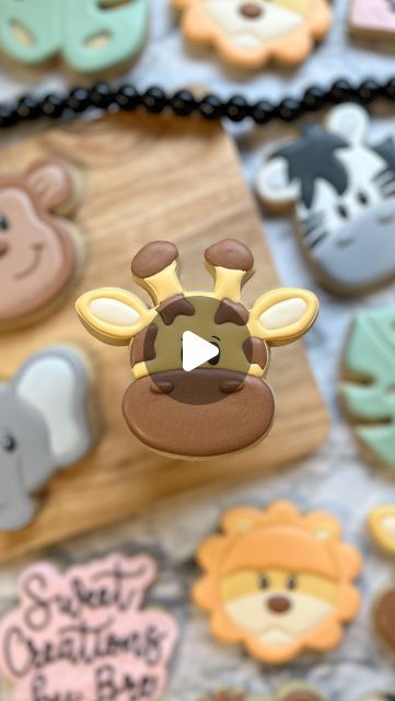 Breanna Deeds on Instagram: "The sweetest little giraffe cookie 🦒  #customcookies #decoratedcookies #cookiesofinstagram #royalicingcookies #cookieart #cookier #sweetcreationsbybre #safaricookies #safaribirthday #wildonecookies #firstbirthdaycookies #cookiedecoratingvideos #cookiedecorating #oddlysatisfying #satisfyingvideos" Safari Royal Icing Cookies, Giraffe Decorated Cookies, Royal Icing Cookies Animals, Safari Animal Cookies Decorated, Safari Cookies Decorated, Safari Sugar Cookies, Safari Animal Cookies, Giraffe Cookie, Lion Cookies