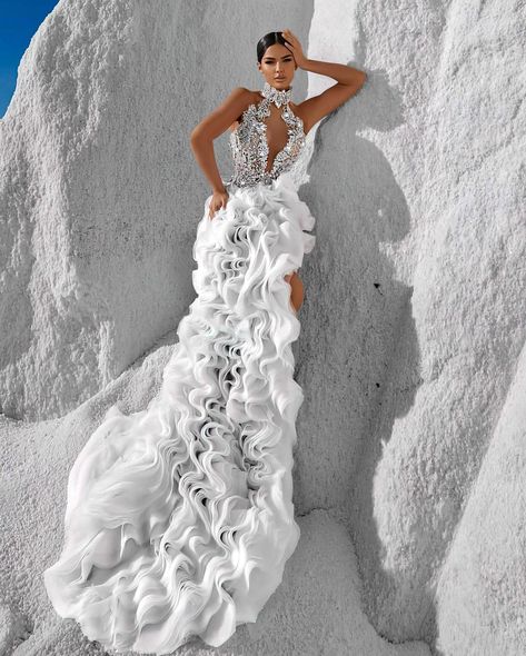 To acquire this exclusive Haute Couture Wedding Dress, reach out via DM. This enchanting gown epitomizes haute couture, combining dramatic design with superb craftsmanship. The dress showcases a form-fitting bodice embellished with delicate, hand-embroidered floral appliqués that gracefully extend over the shoulders and down the torso. These details create a striking contrast against the skin, highlighting the deep plunging neckline and enhancing the dress's captivating allure. A high halte... Embellished Corset, Black Floor Length Dress, Haute Couture Wedding, Haute Couture Wedding Dress, Couture Wedding Dress, Custom Made Dresses, Exquisite Gowns, Eternal Beauty, Long Sleeve Gown